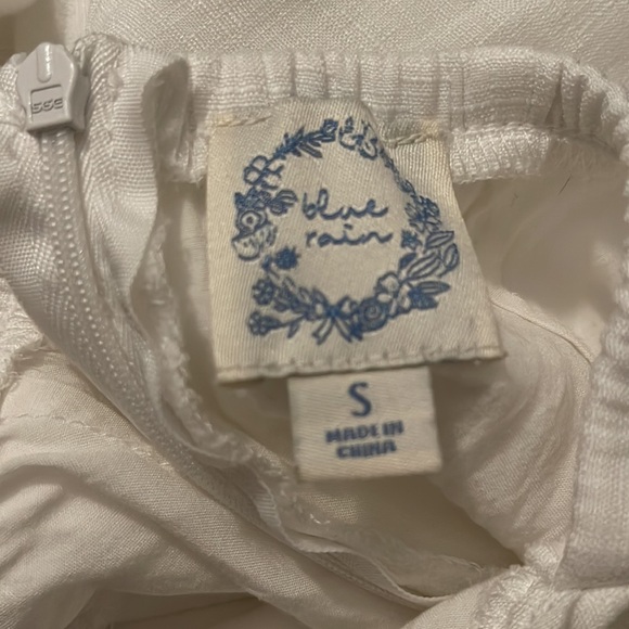 White sundress with tie back and flowy ruffle bottom - Picture 5 of 6